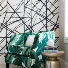 Living Space With Graphic Black-and-White Wallpaper, Green Leaf Chair