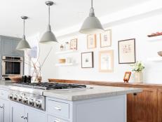 Galley Kitchen With Gray Pendant Lights