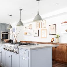 Galley Kitchen With Gray Pendant Lights