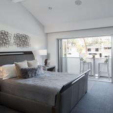 Modern Gray Bedroom With Gray Carpet and Sleigh Bed