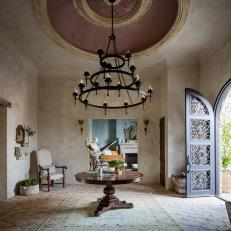 Entryway of Luxury Home With Iron Chandelier
