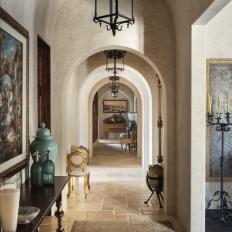 Arched Hallway With Iron Pendant Lights