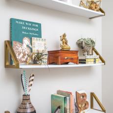 Eclectic Mix of Accessories on Floating Shelves