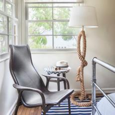 Contemporary Silver Chair in Bedroom With Coastal Rope Stand Lamp and Blue and White Striped Rug
