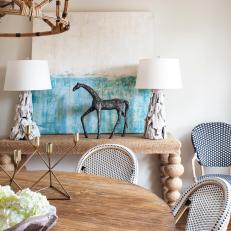 Natural Textures in Coastal Dining Room With Driftwood Lamps, Bamboo Light Fixture and Natural Wood Table