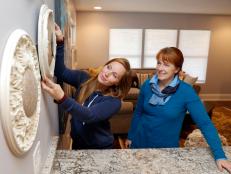 As seen on Good Bones, Mina Starsiak (L) and Karen E Laine stage the renovated home on Woodlawn.  (action)