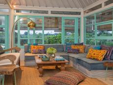 Tropical Sunroom With Colorful Pillows, Sectional & Aqua Windows Panes