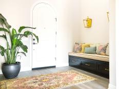 Transitional Entry With Houseplant, Built-In Bench & Arched Door