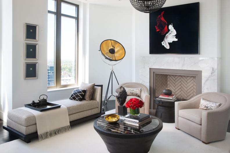 White Contemporary Living Space With Neutral, Red and Black Accents