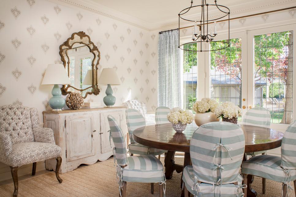 Shabby Chic Dining Room With Stripe Slip Cover Chairs Distressed Wood Cabinet And White Hydrangea Centerpiece Hgtv