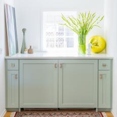 Blue Storage Cabinet With Rug