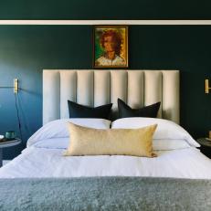 Vibrant Blue Bedroom With Upholstered White Headboard