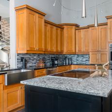 Contemporary Kitchen With Black Quartz Countertop