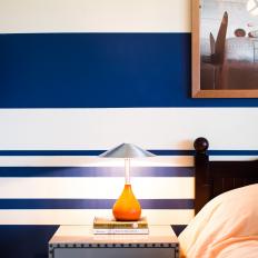 Detail of Nightstand and Blue & White Striped Wall