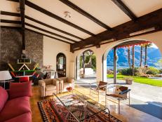 Mediterranean Living Room With Exposed Wood Beams