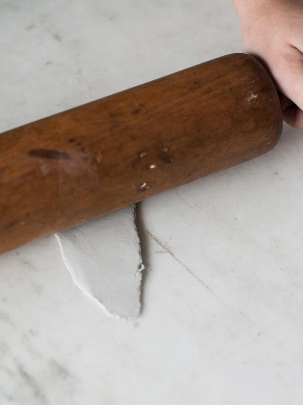 Step 1:Roll Out ClayOn a clean and dry work surface, roll out clay to approximately 1/8 inch thickness with a rolling pin.