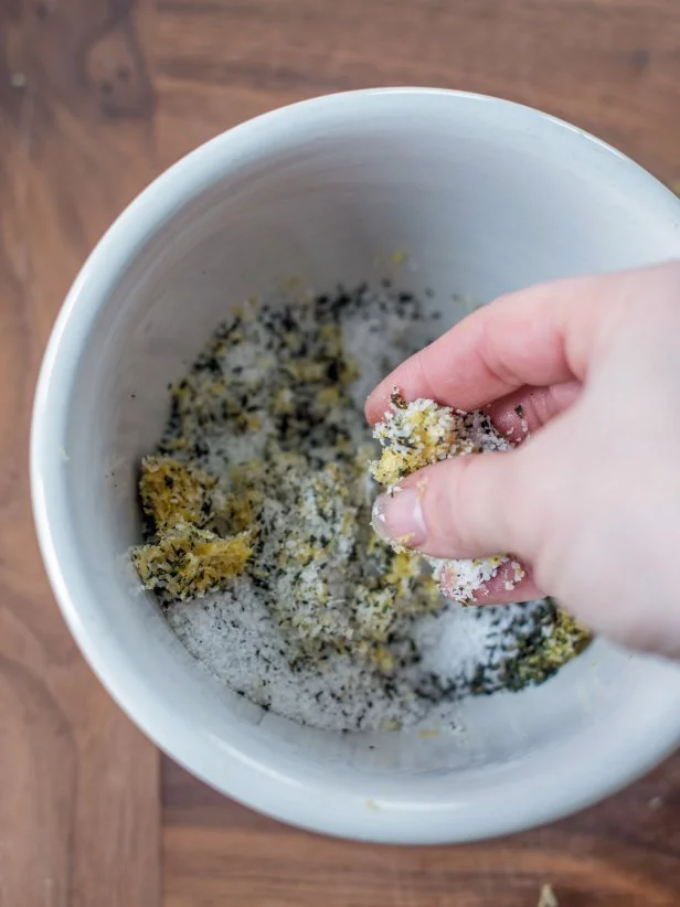 Step 3: Mix Salt
Add half a cup coarse salt to mixing bowl.  Use clean fingers to mix herbs and zest into salt.  Rub between your fingers to release lemon oils.  Repeat until completely combined.