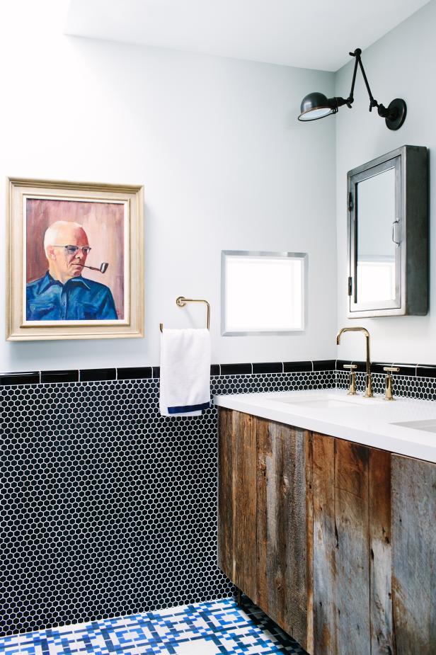 Black and White Bathroom With Blue Floor Tiles and Wooden Vanity