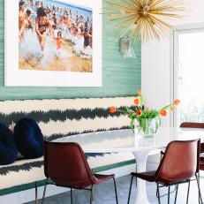 Eclectic Dining Room With Black-and-White Striped Bench Seat