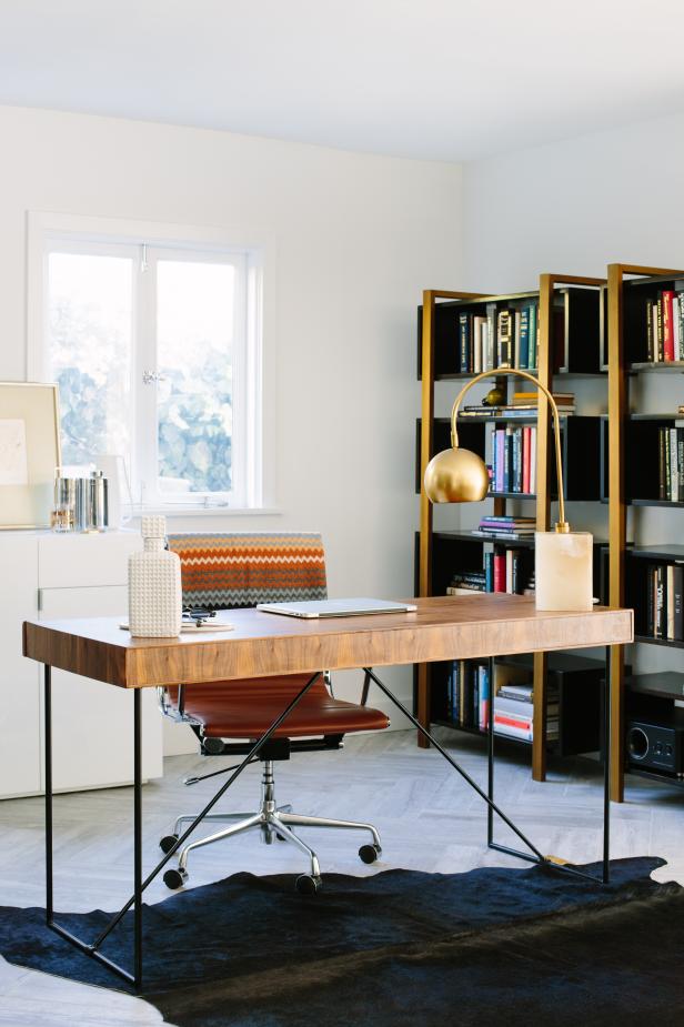 White Home Office With Wooden Desk and Brass Desk Lamp