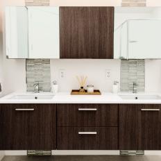Modern Bathroom Vanity With Dual Sinks and Stone Tile Backsplash