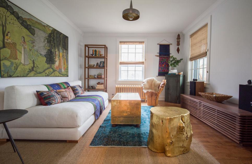 Eclectic Living Room With Low Level Furniture, Arm-Free White Sofa, and Gold Wood Stump Stool 