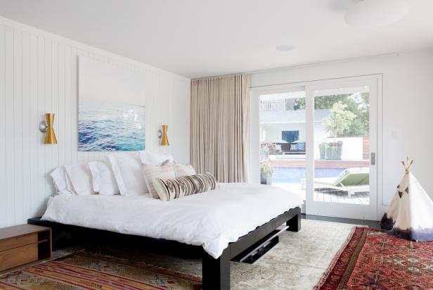 Modern Master Bedroom With Colorful Patterned Rugs Sliding