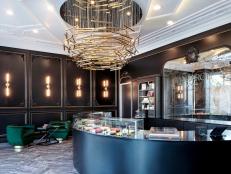 Art Decor Macaron Bakery With Brass Chandelier, Crescent Bar and Jade Velvet Chairs 