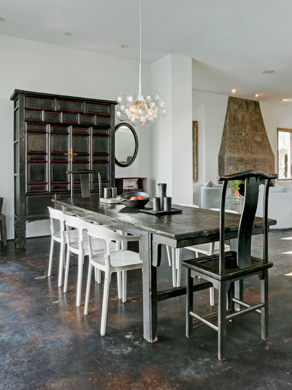 Unique Contemporary Dining Room With Large Asian Cabinet Tall End Chairs And Dark Stone Floor Hgtv