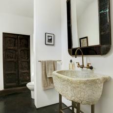 Asian Bathroom Vanity With Dark Rimmed Mirror, Textured Pedestal Sink and Black Stone Floor 