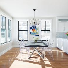White Eclectic Dining Room With Ghost Chairs