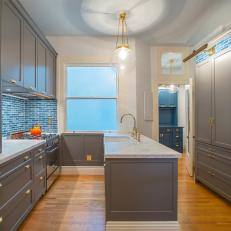Gray Transitional Kitchen With Marble Countertops