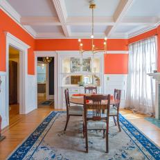 Eclectic, Neon Orange Dining Room With Fireplace