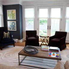 Sitting Area in Navy Blue Family Room With French Doors