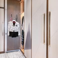 Master Closet Outfitted With Wall-to-Wall Wardrobes and Drawers