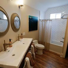 Reclaimed Wood Floor and Subway Tile Continue Elegant, Industrial Design Into Bathroom