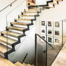 Floating Stairwell With Glass Wall