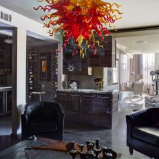 Contemporary Sitting Room With Dark, Soothing Color Scheme and Bold Contemporary Blown Glass Art Piece 