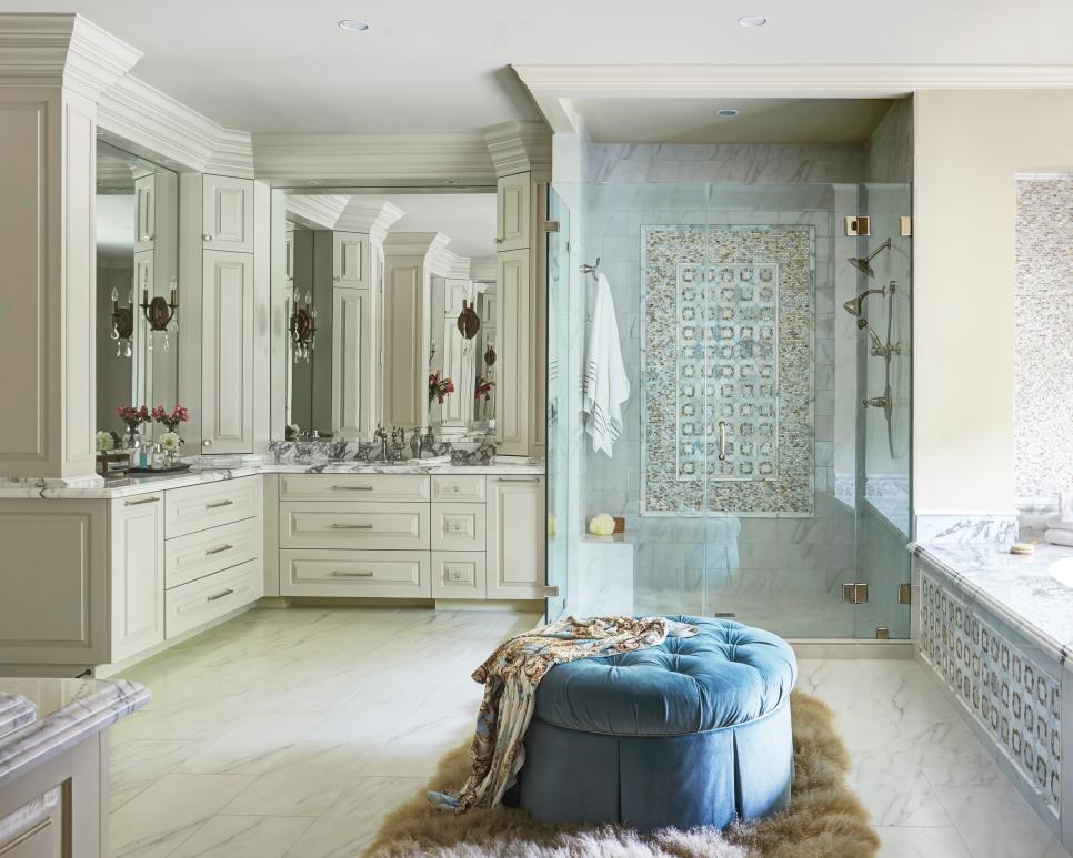 Elegant Main Bathroom With Blue Ottoman Shower With Glass Door And Double Vanity Hgtv