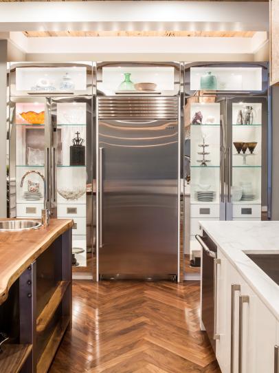 Glamorous Back Lit Glass Door Cabinets Surrounding Stainless