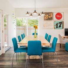 Contemporary Dining Room With Blue Chairs