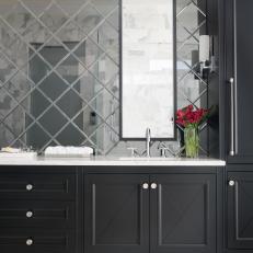 Contemporary Master Bathroom With Mirrored Backsplash