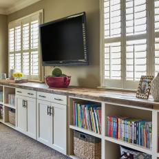 Built-In Shelving With Baskets and Books