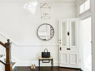 Transitional White Foyer With Stairs