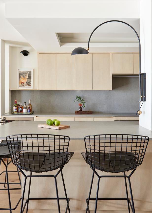 White Modern Kitchen With Bertoia Chairs & Neutral Cabinets