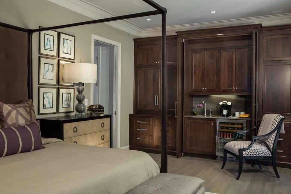 Transitional Master Bedroom With Dark Wood Floor to Ceiling Wall Unit