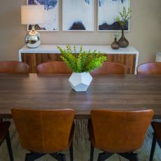 Neutral Midcentury Modern Dining Room With Blue Art