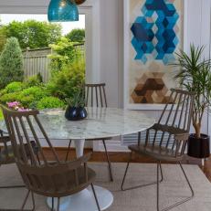 Midcentury Modern Dining Nook With Blue Art