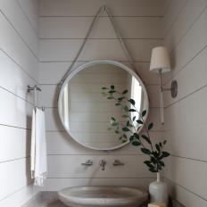 White Country Powder Room With Round Mirror