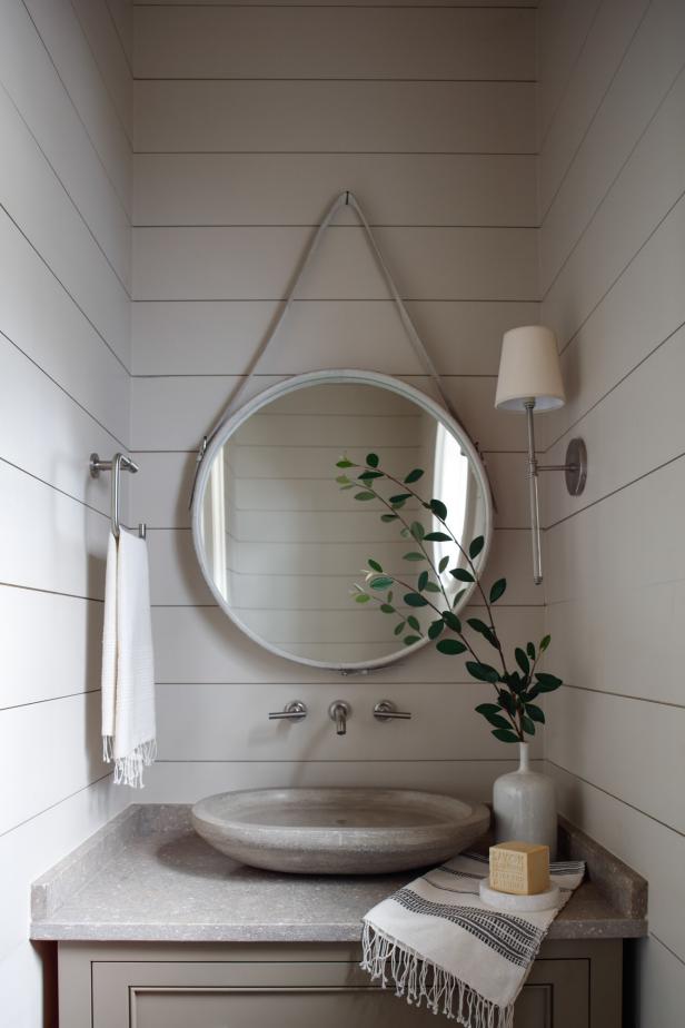 White Country Powder Room With Round Mirror | HGTV